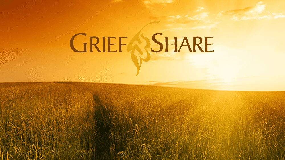 GriefShare logo overlaid on a photo of a sunlit field